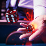 image showing a dealer throwing two craps dice in the air