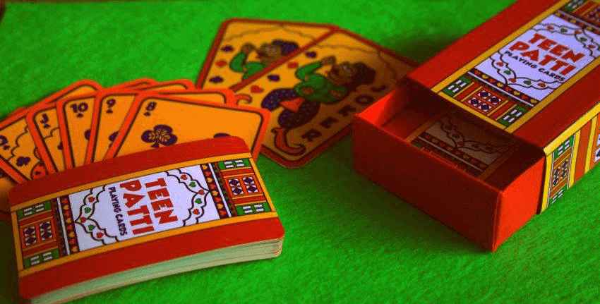 teen patti card deck on green felt